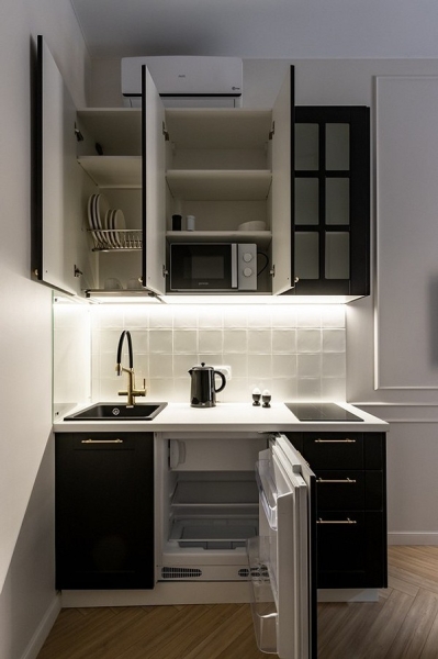 Как сделать подсветку на кухне под шкафчиками: инструкции для LED-ленты и накладных светильников